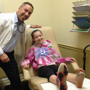 Dr. Ken with girl